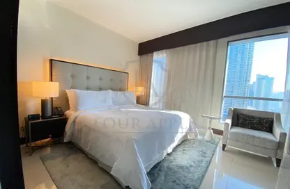 Room / Bedroom image for: Apartment - 1 Bedroom - 2 Bathrooms for rent in Burj Lake Hotel - The Address DownTown - Downtown Dubai - Dubai, Image 1