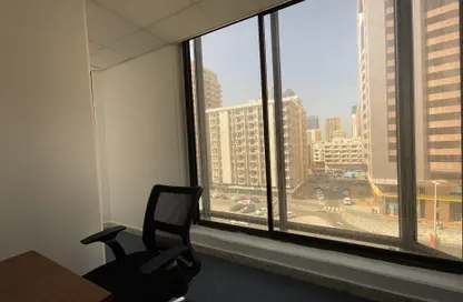 Office Space - Studio - 4 Bathrooms for rent in Tourist Club Area - Abu Dhabi