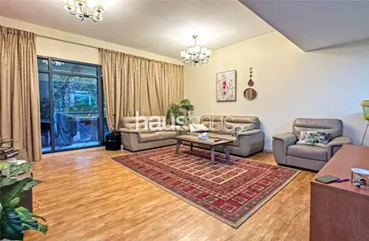 Living Room image for: Apartment - 3 Bedrooms - 2 Bathrooms for sale in Al Ghaf 2 - Al Ghaf - Greens - Dubai, Image 1