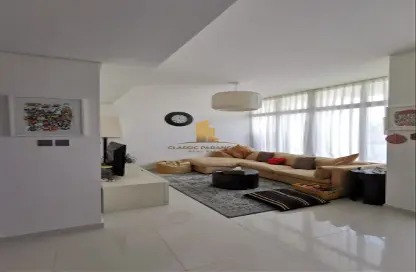 Living Room image for: Townhouse - 3 Bedrooms - 3 Bathrooms for sale in Amazonia EX - Amazonia - Damac Hills 2 - Dubai, Image 1