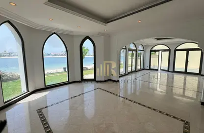 Villa - 4 Bedrooms - 6 Bathrooms for rent in Garden Homes Frond C - Garden Homes - Palm Jumeirah - Dubai