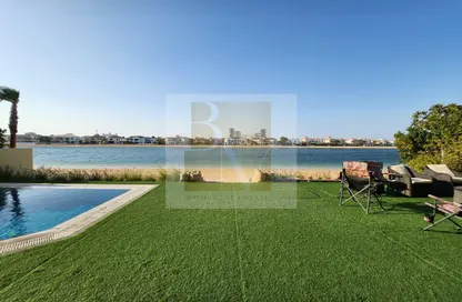 Villa - 4 Bedrooms - 5 Bathrooms for rent in Garden Homes Frond C - Garden Homes - Palm Jumeirah - Dubai