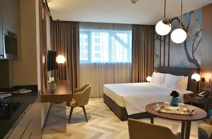 صورة لـ غرفة- غرفة النوم النزل و الشقق الفندقية - 1 حمام للايجار في فندق ميلينيوم بلايس البرشاء - برشا هايتس (تيكوم) - دبي ، صورة رقم 1