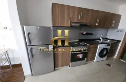 Apartment - 1 Bathroom for rent in National Bonds Residence - Jumeirah Village Circle - Dubai