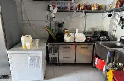 صورة لـ مطبخ متجر - استوديو للايجار في منطقة المرور - أبوظبي ، صورة رقم 1