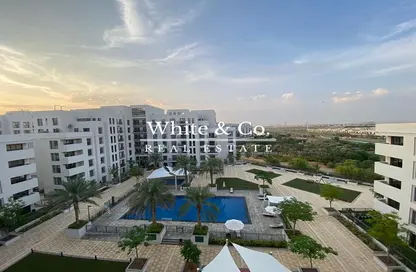 Outdoor Building image for: Apartment - 2 Bedrooms - 2 Bathrooms for rent in Zahra Apartments 1A - Zahra Apartments - Town Square - Dubai, Image 1