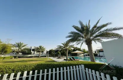 Townhouse - 3 Bedrooms - 4 Bathrooms for sale in Aurum Villas - Juniper - Damac Hills 2 - Dubai