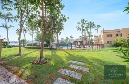 Villa - 4 Bedrooms - 6 Bathrooms for sale in Canal Cove Frond M - Canal Cove Villas - Palm Jumeirah - Dubai