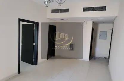 Apartment - 1 Bedroom - 2 Bathrooms for sale in Lilies Tower - Emirates City - Ajman