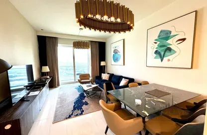 Living / Dining Room image for: Apartment - 2 Bedrooms - 4 Bathrooms for sale in Avani Palm View Hotel  and  Suites - Dubai Media City - Dubai, Image 1