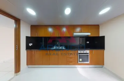 صورة لـ مطبخ شقة - 3 غرف نوم - 2 حمامات للايجار في 1 سيلفر ساند - منخول - بر دبي - دبي ، صورة رقم 1