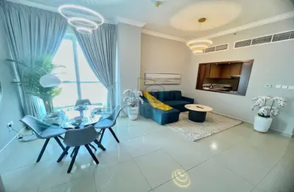 Living / Dining Room image for: Apartment - 1 Bedroom - 2 Bathrooms for rent in Fairview Residency - Business Bay - Dubai, Image 1