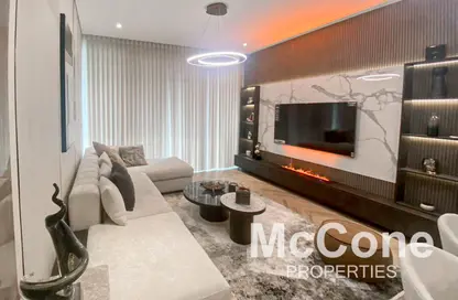 Living Room image for: Apartment - 2 Bedrooms - 3 Bathrooms for rent in 1 Residences - Wasl1 - Al Kifaf - Dubai, Image 1