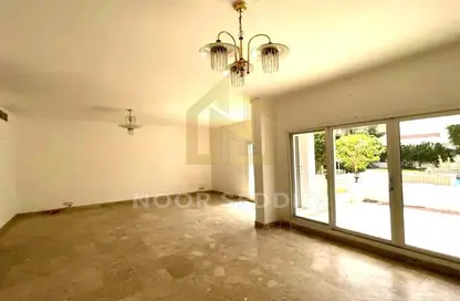 Villa - 4 Bedrooms - 5 Bathrooms for rent in Falcon Villas - Al Garhoud - Dubai