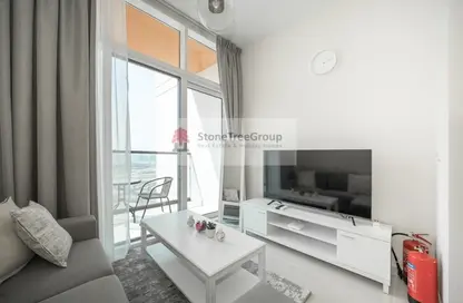 Living Room image for: Apartment - 1 Bedroom - 1 Bathroom for rent in Golf Vita A - Golf Vita - DAMAC Hills - Dubai, Image 1