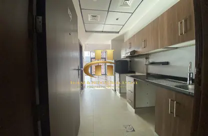 Apartment - 1 Bathroom for rent in National Bonds Residence - Jumeirah Village Circle - Dubai