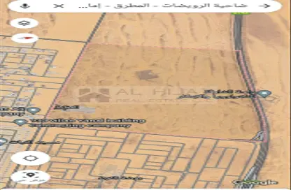 أرض - استوديو للبيع في روضة القرط - ضاحية الروضات - الشارقة