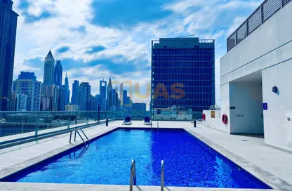 Apartment - 1 Bedroom - 2 Bathrooms for rent in Jumeirah Garden City - Al Satwa - Dubai