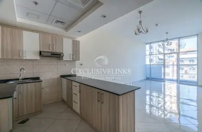 Apartment - Studio - 1 Bathroom for rent in Chaimaa Premiere - Jumeirah Village Circle - Dubai