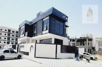 Villa - 5 Bedrooms - 7 Bathrooms for sale in Ajman Hills - Al Alia - Ajman