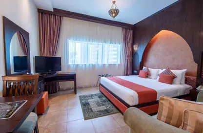 صورة لـ غرفة- غرفة النوم شقة - 1 حمام للايجار في فيرست سنترال للشقق الفندقية - برشا هايتس (تيكوم) - دبي ، صورة رقم 1