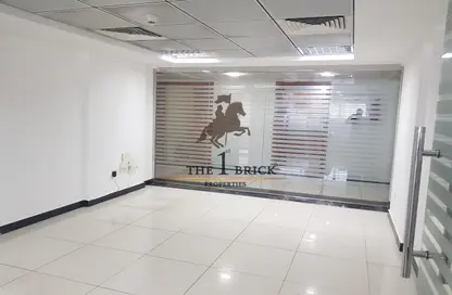 Office Space - Studio - 2 Bathrooms for rent in Zig Zag Building - Tourist Club Area - Abu Dhabi