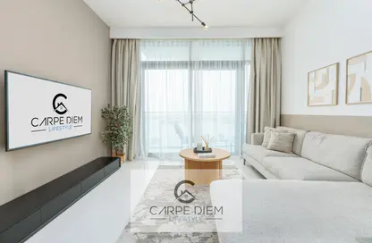 Living Room image for: Apartment - 2 Bedrooms - 2 Bathrooms for rent in Beach Vista - EMAAR Beachfront - Dubai Harbour - Dubai, Image 1