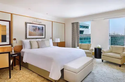 صورة لـ غرفة- غرفة النوم النزل و الشقق الفندقية - 3 غرف نوم - 4 حمامات للايجار في ريتز كارلتون - مركز دبي المالي العالمي - دبي ، صورة رقم 1