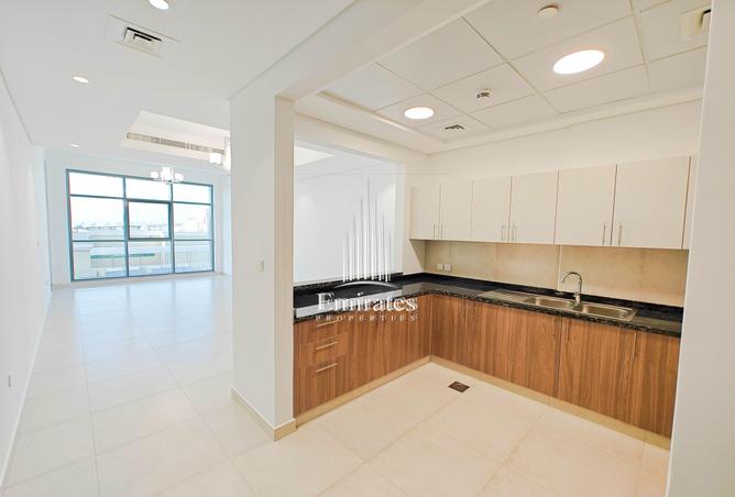 Rent in Al Garhoud: 1 BHK | Balcony | Laundry Space | Property Finder