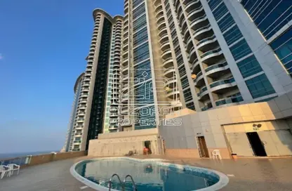 Apartment - 2 Bedrooms - 2 Bathrooms for sale in Corniche Tower - Ajman Corniche Road - Ajman