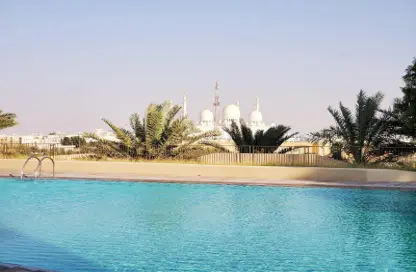 Apartment - 2 Bedrooms - 3 Bathrooms for rent in Rihan Heights - Grand Mosque District - Abu Dhabi