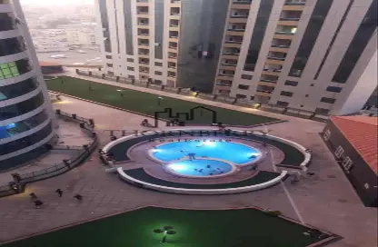 Apartment - 1 Bedroom - 2 Bathrooms for rent in Orient Tower 2 - Orient Towers - Al Bustan - Ajman