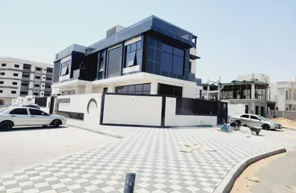 Villa - 4 Bedrooms for sale in Ajman Global City - Al Alia - Ajman