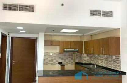 Apartment - 1 Bedroom - 2 Bathrooms for rent in F49 Avenue Building - Phase 3 - International City - Dubai