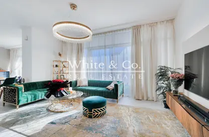 Living Room image for: Duplex - 3 Bedrooms - 3 Bathrooms for sale in Hameni Tower - Jumeirah Village Circle - Dubai, Image 1