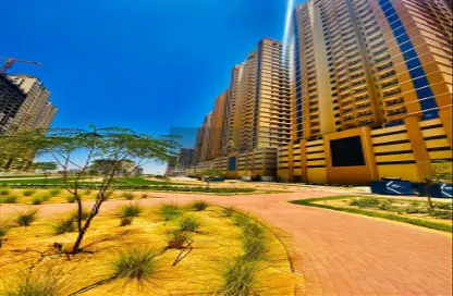 Outdoor Building image for: Apartment - 1 Bedroom - 2 Bathrooms for rent in Paradise Lakes - Emirates City - Ajman, Image 1