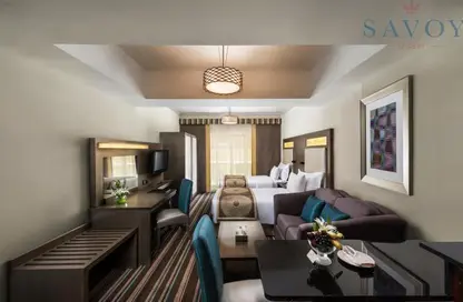 Living / Dining Room image for: Apartment - 1 Bathroom for rent in Mankhool Road - Bur Dubai - Dubai, Image 1