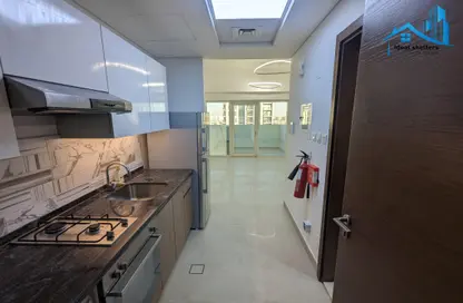 Kitchen image for: Apartment - 1 Bathroom for rent in Azizi Star - Al Furjan - Dubai, Image 1