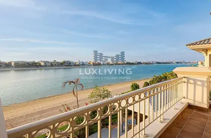 Villa - 5 Bedrooms - 6 Bathrooms for rent in Garden Homes Frond E - Garden Homes - Palm Jumeirah - Dubai