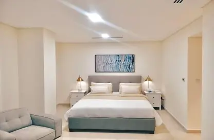 Room / Bedroom image for: Apartment - 1 Bedroom - 2 Bathrooms for sale in Janayen Avenue - Mirdif Hills - Mirdif - Dubai, Image 1