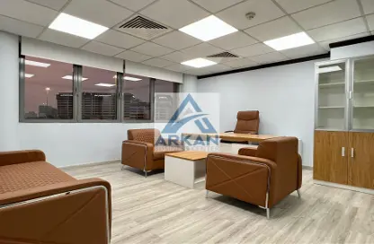 Living Room image for: Business Centre - Studio - 5 Bathrooms for rent in Al Ashram Building - Al Garhoud - Dubai, Image 1