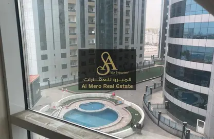 Apartment - 1 Bedroom - 2 Bathrooms for rent in Orient Tower 1 - Orient Towers - Al Bustan - Ajman