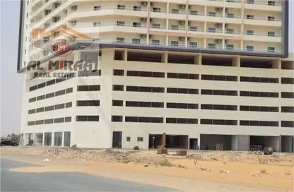 Apartment - 2 Bedrooms - 2 Bathrooms for sale in Smart Tower 1 - Al Amerah - Ajman