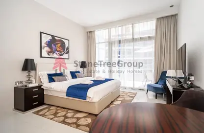 Room / Bedroom image for: Apartment - 1 Bathroom for rent in Golf Terrace A - NAIA Golf Terrace at Akoya - DAMAC Hills - Dubai, Image 1