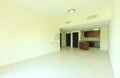 Empty Room image for: Apartment - 1 Bedroom - 2 Bathrooms for sale in Building 38 to Building 107 - Mediterranean Cluster - Discovery Gardens - Dubai, Image 1