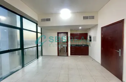 Apartment - 1 Bathroom for rent in Al Shaiba Building - Dubai Outsource Zone - Dubai