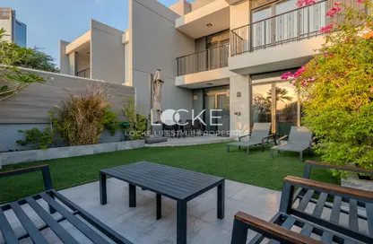 Townhouse - 3 Bedrooms - 4 Bathrooms for sale in Casa Flores - Green Community Motor City - Motor City - Dubai