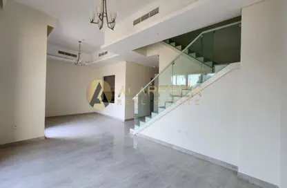 Villa - 4 Bedrooms - 6 Bathrooms for rent in Sevilla Village - Victory Heights - Dubai Sports City - Dubai