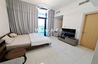 Room / Bedroom image for: Apartment - 1 Bathroom for sale in The Square Tower - Jumeirah Village Circle - Dubai, Image 1