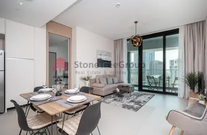Living / Dining Room image for: Apartment - 1 Bedroom - 1 Bathroom for rent in Jumeirah Gate Tower 1 - The Address Jumeirah Resort and Spa - Jumeirah Beach Residence - Dubai, Image 1